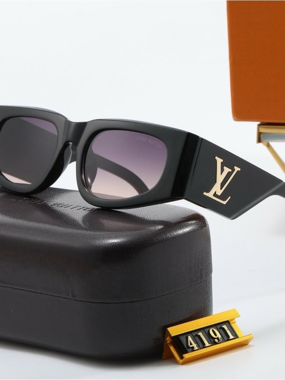 Black Sunglasses with Gold Logo and Gradient Purple Lenses
